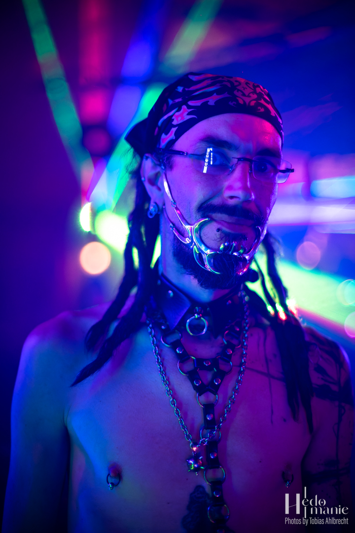 Neon-lit portrait from the June event campaign.